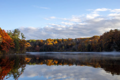 Light blue sky and colorful trees at Haviland's Cove (Glens Falls, NY)
