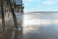 Long exposure of ocean waves and blue skies (Old Orchard Beach, ME)