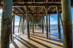 View of the ocean from under the boardwalk (Old Orchard Beach, ME)